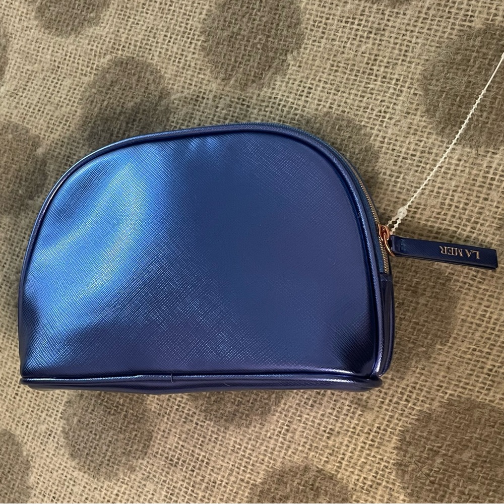 SOLD Offline: NWOT: La Mer Metallic Blue Cosmetic Travel Bag